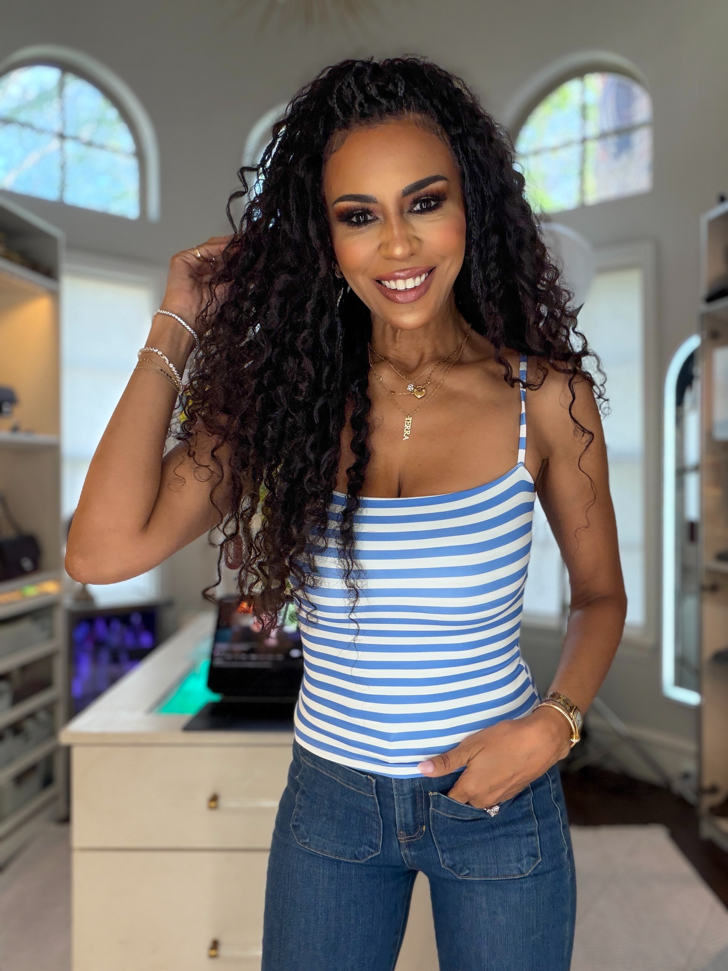 Terra in a casual blue striped top